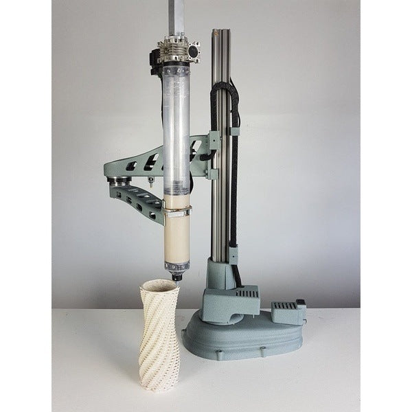3D Potterbot Scara Mini v1 ceramic 3D printer, side view with a beautiful ceramic vase.